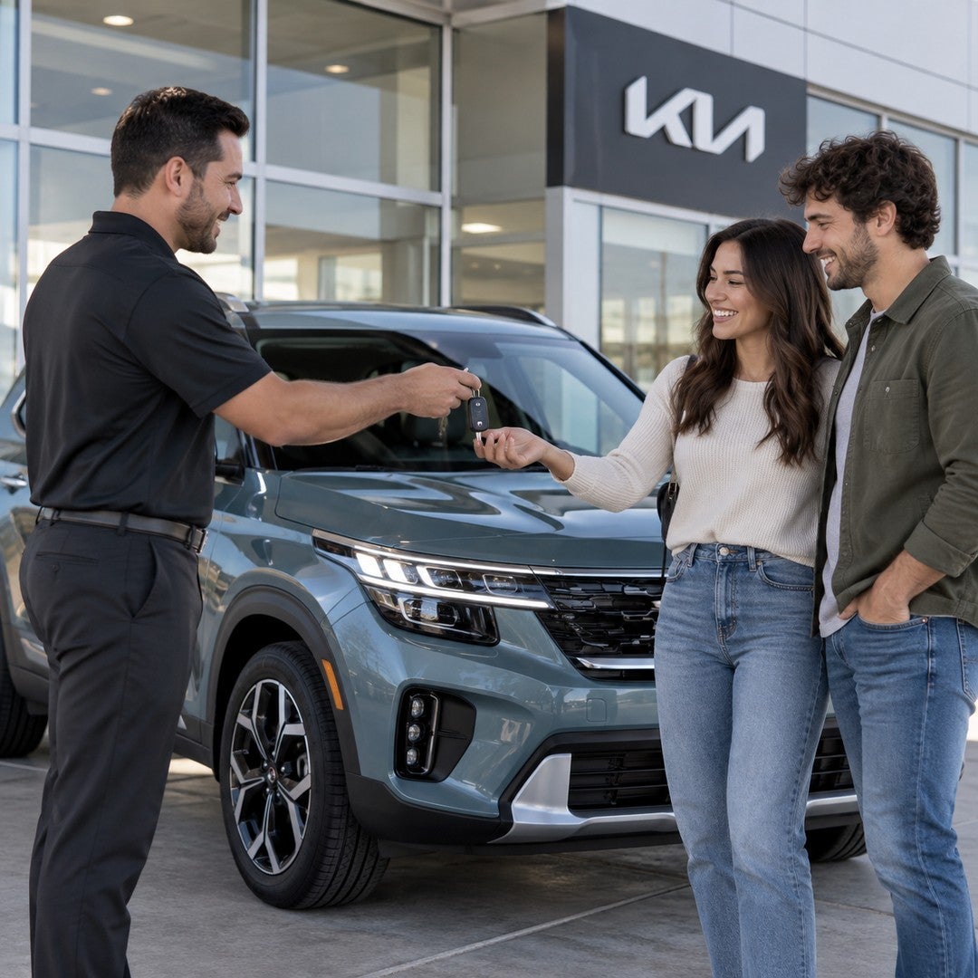New Kia Seltos delivery and key handoff at a Kia dealership